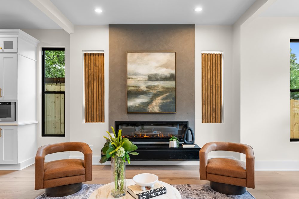 The Monarch at Buckhead — fireplace lounge with custom wood accents